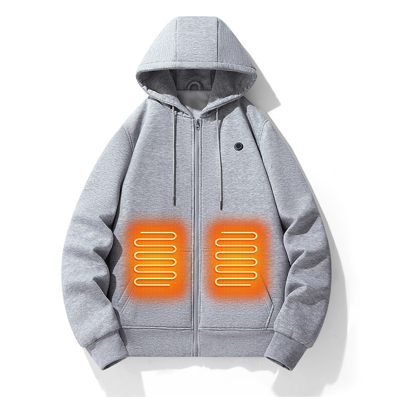 Cozy electric heating hoodie with zipper and adjustable hood. Gray fleece fabric with visible heating panels on the pockets. Stylish and functional outdoor clothing for cold weather.