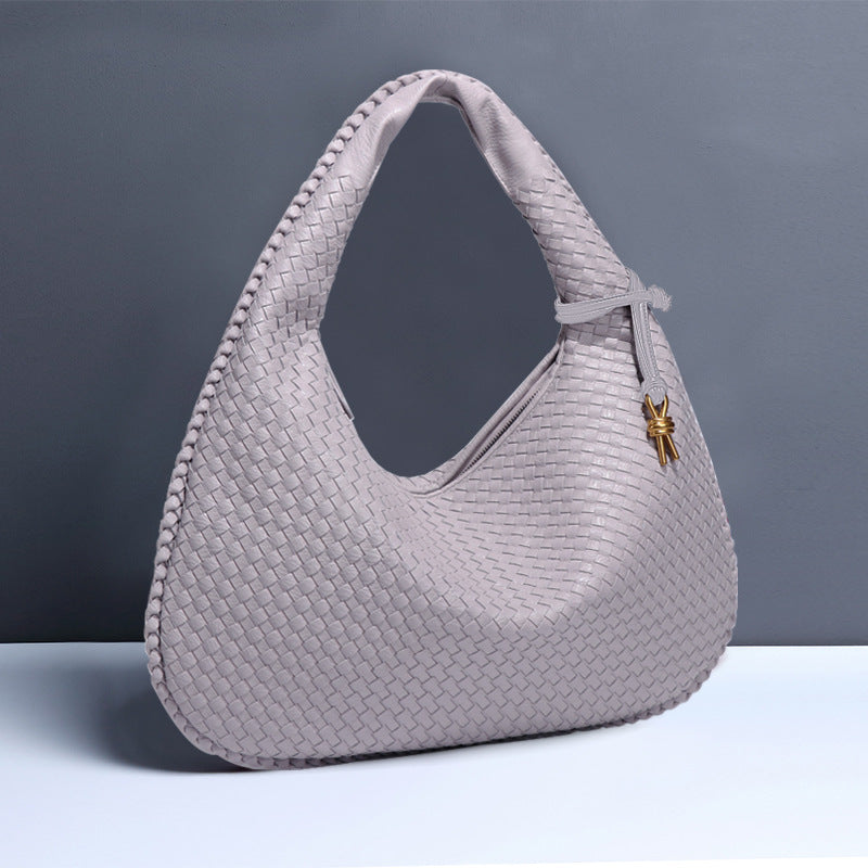 Crescent shaped women's bag hand woven hand-held dumpling bag fashionable single shoulder armpit bag